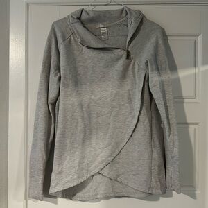 Athletic asymmetrical sweater with thumb holes